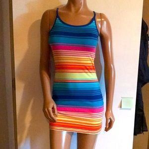 Form fitting bright summer dress. Mannequin is 6’ tall.  NWOT
